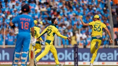 Australia's Glenn Maxwell celebrates after taking the wicket of India's Rohit Sharma (REUTERS)