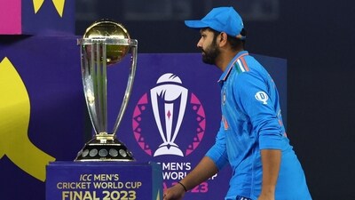 Rohit Sharma walks past the ICC Cricket World Cup trophy during the medal ceremony&nbsp; (REUTERS)