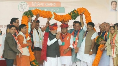 Prime Minister Narendra Modi being garlanded during a public meeting ahead of Rajasthan assembly elections, in Taranagar (PTI) Prime Minister Narendra Modi being garlanded during a public meeting ahead of Rajasthan assembly elections, in Taranagar (PTI)