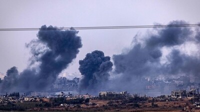 Israel-Hamas War: Smoke rising above buildings during an Israeli strike on the Gaza Strip. (AFP) Israel-Hamas War: Smoke rising above buildings during an Israeli strike on the Gaza Strip. (AFP)