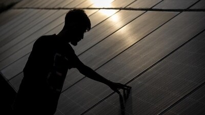 To solarise our everyday lives, we need both a top down and bottom up approach. (AP) To solarise our everyday lives, we need both a top down and bottom up approach. (AP)