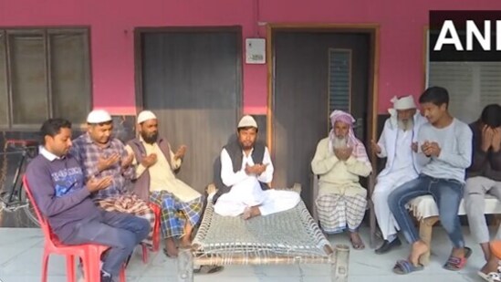 People offering prayers in Mohammed Shami's village Amroha. (X/@ANI)