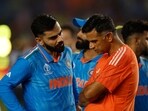 India coach Rahul Dravid and Virat Kohli look dejected during the presentation ceremony after losing the ICC Cricket World Cup final