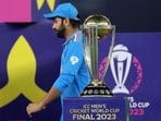 Cricket - ICC Cricket World Cup 2023 - Final - India v Australia - Narendra Modi Stadium, Ahmedabad, India - November 19, 2023 India's Rohit Sharma walks past the ICC Cricket World Cup trophy during the medal ceremony REUTERS/Amit Dave