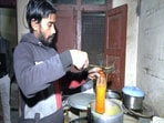 Hot Khichdi being filled in cylindrical bottles for labourers trapped in Silkyara tunnel Hot Khichdi being filled in cylindrical bottles for labourers trapped in Silkyara tunnel