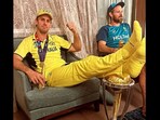 Snapshot of Mitchell Marsh with his feet on the World Cup Trophy. 