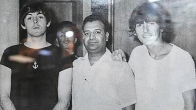 A photograph of The Beatles along with Bishan Dass, owner of Rikhi Ram Musical Instruments Store, displayed inside the store at Connaught Place in New Delhi. (Hindustan Times) A photograph of The Beatles along with Bishan Dass, owner of Rikhi Ram Musical Instruments Store, displayed inside the store at Connaught Place in New Delhi. (Hindustan Times)