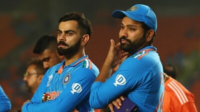 India's Virat Kohli and Rohit Sharma look dejected after losing the ICC Cricket World Cup final (REUTERS)