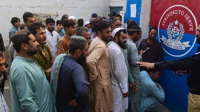 Afghan refugees queue outside a police station for their data verification by the National Database and Registration Authority (NADRA) in Karachi. (AFP) Afghan refugees queue outside a police station for their data verification by the National Database and Registration Authority (NADRA) in Karachi. (AFP)