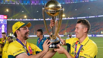 Australian players Travis Head and Marnus Labuschagne pose for photographs with the trophy as they celebrate after winning the ICC Men's Cricket World Cup 2023 finals at the Narendra Modi Stadium, in Ahmedabad. (PTI) Australian players Travis Head and Marnus Labuschagne pose for photographs with the trophy as they celebrate after winning the ICC Men's Cricket World Cup 2023 finals at the Narendra Modi Stadium, in Ahmedabad. (PTI)
