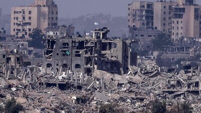 Israel-Hamas War: Israeli flags flying over destroyed buildings inside the Gaza Strip. (AFP) Israel-Hamas War: Israeli flags flying over destroyed buildings inside the Gaza Strip. (AFP)