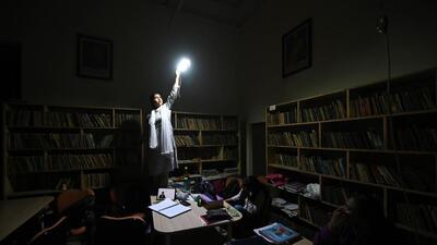 With no power at the Hardayal Library, students and staffers are forced to use mobile phone and torches to study. (Sanchit Khanna/HT Photo) With no power at the Hardayal Library, students and staffers are forced to use mobile phone and torches to study. (Sanchit Khanna/HT Photo)