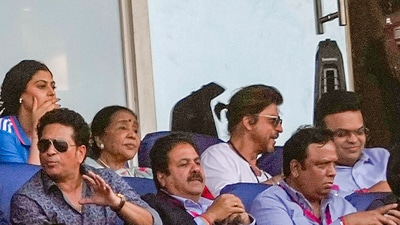 Asha Bhosle and Shah Rukh Khan at the Narendra Modi Stadium in Ahmedabad. (PTI) Asha Bhosle and Shah Rukh Khan at the Narendra Modi Stadium in Ahmedabad. (PTI)