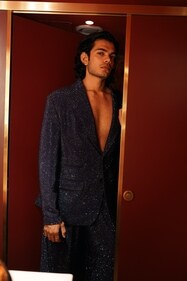 Sequined pantsuit.