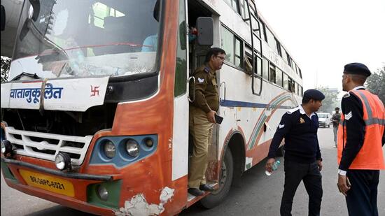 After two buses caught fire on November 16, the traffic police and transport department seized all buses running without fitness certificates and issued them fines. (Sunil Ghosh/HT Photo)