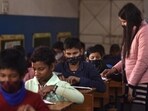 A view from inside a classroom at a government school.