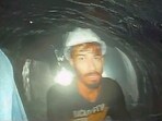 This screen grab image provided by the Uttarakhand State Disaster Response Force (SDRF) shows one of the 40 workers trapped inside a collapsed tunnel in Silkyara. This screen grab image provided by the Uttarakhand State Disaster Response Force (SDRF) shows one of the 40 workers trapped inside a collapsed tunnel in Silkyara.