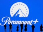 FILE PHOTO: Toy figures of people are seen in front of the displayed Paramount + logo, in this illustration taken January 20, 2022. REUTERS/Dado Ruvic/Illustration/File Photo