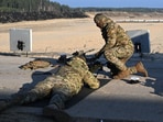 Ukrainian soldiers take part in a sniper shooting exercise at a training facility outside Kyiv, Ukraine Ukrainian soldiers take part in a sniper shooting exercise at a training facility outside Kyiv, Ukraine