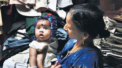 A fear of two families: Babies they cling on to are not theirs A fear of two families: Babies they cling on to are not theirs