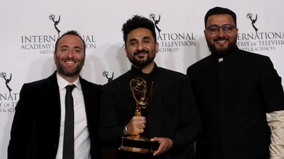 Vir Das and producer Reg Tigerman (left) pose with the Best Comedy award for Vir Das: Landing at the 51st International Emmy Awards in New York City, (REUTERS)