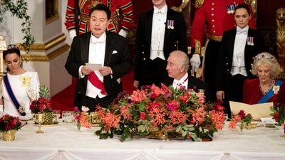 King Charles III listens as President of South Korea Yoon Suk Yeol speaks at the state banquet at Buckingham Palace. (AP) King Charles III listens as President of South Korea Yoon Suk Yeol speaks at the state banquet at Buckingham Palace. (AP)