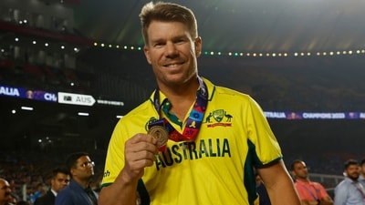 Australia's David Warner celebrates with his medal after winning the ICC Cricket World Cup (REUTERS)