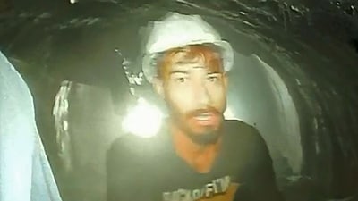 This picture released by Department of Information and Public Relation (DIPR) Uttarakhand and taken with endoscopic camera on November 21 shows a worker trapped inside the under-construction tunnel, days after it collapsed in the Uttarkashi district of India's Uttarakhand state.&nbsp; (AFP)
