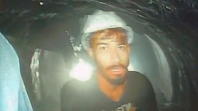 This screen grab image provided by the Uttarakhand State Disaster Response Force (SDRF) shows one of the 40 workers trapped inside a collapsed tunnel in Silkyara. (AP) This screen grab image provided by the Uttarakhand State Disaster Response Force (SDRF) shows one of the 40 workers trapped inside a collapsed tunnel in Silkyara. (AP)