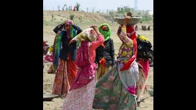 Labourers under Mahatma Gandhi National Rural Employment Guarantee Act (MNREGA) work at a site. (PTI Photo) Labourers under Mahatma Gandhi National Rural Employment Guarantee Act (MNREGA) work at a site. (PTI Photo)