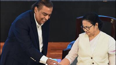 Mukesh Ambani with West Bengal chief minister Mamata Banerjee during the inauguration of the Bengal Global Business Summit in Kolkata on Tuesday. (AFP) Mukesh Ambani with West Bengal chief minister Mamata Banerjee during the inauguration of the Bengal Global Business Summit in Kolkata on Tuesday. (AFP)