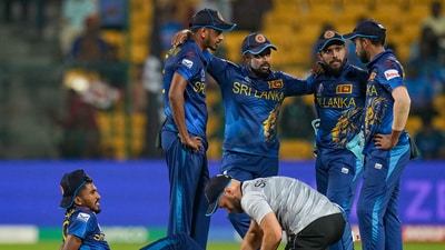 Sri Lanka's Dilshan Madushanka is being attended by physio during the ICC Men's Cricket World Cup match (PTI) Sri Lanka's Dilshan Madushanka is being attended by physio during the ICC Men's Cricket World Cup match (PTI)