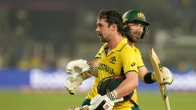 Australia's Travis Head being greeted by teammate Glens Maxwell as the former returns to the pavilion after his dismissal during the ICC Men's Cricket World Cup 2023 final match between against India, at the Narendra Modi Stadium (PTI) Australia's Travis Head being greeted by teammate Glens Maxwell as the former returns to the pavilion after his dismissal during the ICC Men's Cricket World Cup 2023 final match between against India, at the Narendra Modi Stadium (PTI)