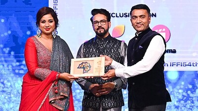 Union Minister for Information & Broadcasting and Youth Affairs & Sports Anurag Singh Thakur with Goa Chief Minister Pramod Sawant as they felicitate singer Shreya Ghoshal during the inaugural ceremony of 54Th International Film Festival of India. (PTI) Union Minister for Information & Broadcasting and Youth Affairs & Sports Anurag Singh Thakur with Goa Chief Minister Pramod Sawant as they felicitate singer Shreya Ghoshal during the inaugural ceremony of 54Th International Film Festival of India. (PTI)