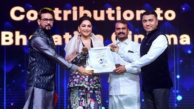 Union Minister for Information & Broadcasting and Youth Affairs & Sports Anurag Singh Thakur, MoS for Fisheries, Animal Husbandry & Dairying, Information and Broadcasting L Murugan and Goa Chief Minister Pramod Sawant felicitate actor Madhuri Dixit during the inaugural ceremony of 54Th International Film Festival of India (IFFI), in Goa. Madhuri also took to the stage with a mesmerising performance on her hit tracks. (PTI) Union Minister for Information & Broadcasting and Youth Affairs & Sports Anurag Singh Thakur, MoS for Fisheries, Animal Husbandry & Dairying, Information and Broadcasting L Murugan and Goa Chief Minister Pramod Sawant felicitate actor Madhuri Dixit during the inaugural ceremony of 54Th International Film Festival of India (IFFI), in Goa. Madhuri also took to the stage with a mesmerising performance on her hit tracks. (PTI)