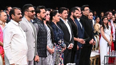 Union Minister for Information and Broadcasting Anurag Singh Thakur with MoS L Murugan, actors Madhuri Dixit, Shahid Kapoor and Sunny Deol, filmmaker Karan Johar and others during the inaugural ceremony of 54Th International Film Festival of India (IFFI), in Goa on Monday. (PTI) Union Minister for Information and Broadcasting Anurag Singh Thakur with MoS L Murugan, actors Madhuri Dixit, Shahid Kapoor and Sunny Deol, filmmaker Karan Johar and others during the inaugural ceremony of 54Th International Film Festival of India (IFFI), in Goa on Monday. (PTI)
