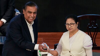 West Bengal Chief Minister Mamata Banerjee and Reliance Industries Chairperson Mukesh Ambani during the inaugural session of the 7th Bengal Global Business Summit, in Kolkata on Tuesday. (PTI) West Bengal Chief Minister Mamata Banerjee and Reliance Industries Chairperson Mukesh Ambani during the inaugural session of the 7th Bengal Global Business Summit, in Kolkata on Tuesday. (PTI)