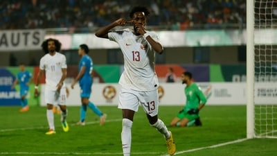 Yusuf Abdurisag celebrates scoring their third goal (REUTERS)