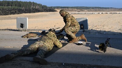 Ukrainian soldiers take part in a sniper shooting exercise at a training facility outside Kyiv, Ukraine (AFP)