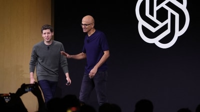 Microsoft CEO Satya Nadella (R) greets the then OpenAI CEO Sam Altman during the OpenAI DevDay event on November 06, 2023 in San Francisco. (AFP) Microsoft CEO Satya Nadella (R) greets the then OpenAI CEO Sam Altman during the OpenAI DevDay event on November 06, 2023 in San Francisco. (AFP)