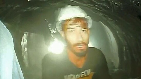 This picture released by Department of Information and Public Relation (DIPR) Uttarakhand and taken with endoscopic camera on November 21 shows a worker trapped inside the under-construction tunnel, days after it collapsed in the Uttarkashi district of India's Uttarakhand state.&nbsp;(AFP)