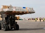 Workers unload humanitarian aid at Egypt's al-Arish Airport on November 22. Workers unload humanitarian aid at Egypt's al-Arish Airport on November 22.