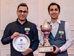 Pankaj Advani (right) and runner-up Sourav Kothari (left) pose with their respective trophies Pankaj Advani (right) and runner-up Sourav Kothari (left) pose with their respective trophies