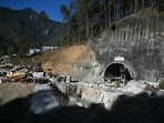 A general view shows the entrance of the under-construction Silkyara road tunnel in Uttarkashi. A general view shows the entrance of the under-construction Silkyara road tunnel in Uttarkashi.