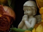 Representative image of a little angel praying. Representative image of a little angel praying.