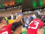 Emi Martinez tried to intervene as the local police clashed with Argentine fans.