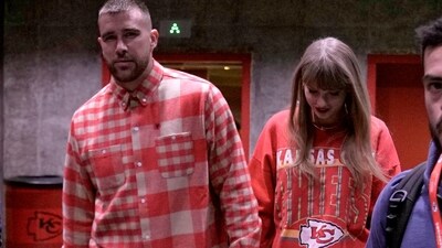 Kansas City Chiefs tight end Travis Kelce, left, and singer Taylor Swift leave Arrowhead stadium after an NFL football game between the Chiefs and the Los Angeles Chargers, Sunday, Oct. 22, 2023, in Kansas City, Mo. (AP Photo/Charlie Riedel) (AP)