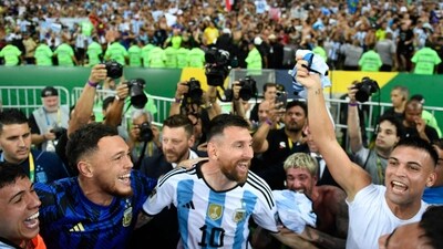 Argentina's forward Lionel Messi (C) celebrates with teammates at the end of the 2026 FIFA World Cup South American qualification football match between Brazil and Argentina at Maracana Stadium in Rio de Janeiro, Brazil (AFP)