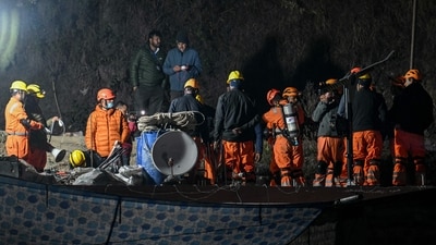 National Disaster Response Force (NDRF) personnel prepare to enter into the tunnel as rescue operation moves into its final phase, for workers trapped in the Silkyara under construction road tunnel, days after it collapsed in the Uttarkashi district of India's Uttarakhand state on November 22, 2023. (AFP) National Disaster Response Force (NDRF) personnel prepare to enter into the tunnel as rescue operation moves into its final phase, for workers trapped in the Silkyara under construction road tunnel, days after it collapsed in the Uttarkashi district of India's Uttarakhand state on November 22, 2023. (AFP)