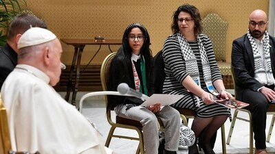 Pope Francis meets with Palestinians whose relatives are stranded in Gaza, amid conflict between Israel and the Palestinian Islamist group Hamas, at the Vatican (via REUTERS)